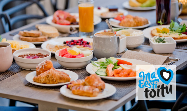 A rich breakfast at Nordic Hotel Forum – gluten-free and vegan options, hot dishes, pastries, fresh fruits, and coffee beverages